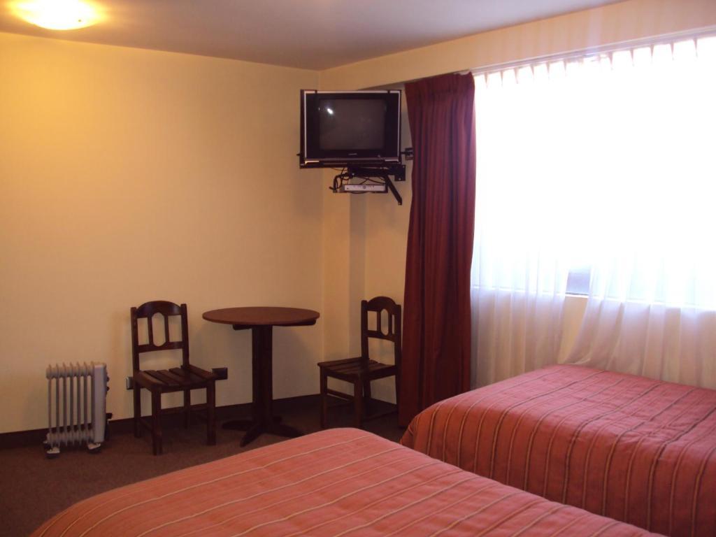 Mosoq Inn Puno Rom bilde