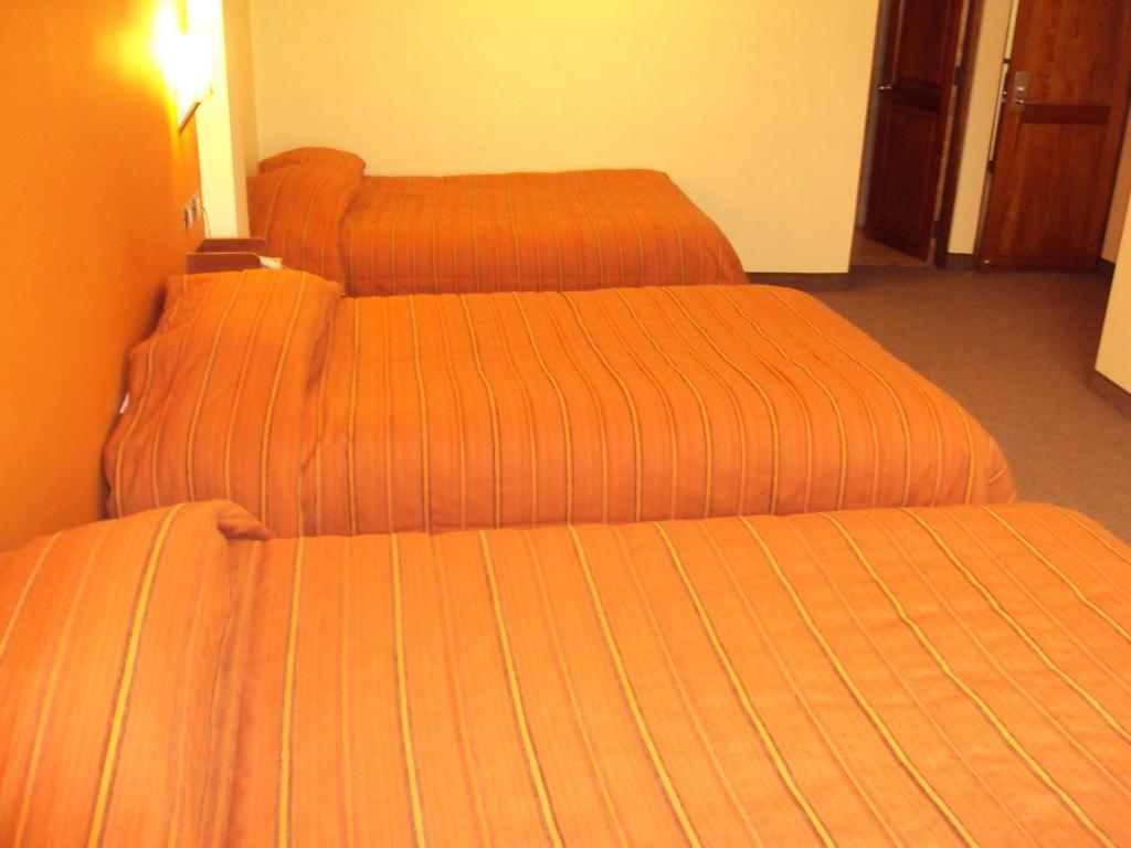 Mosoq Inn Puno Rom bilde